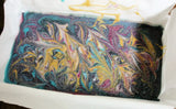 Abstractly swirled multi-colored fudge in parchment-lined pan for Rimmed Soap Challenge March 2016