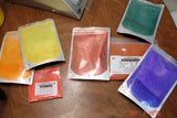 Assorted colorful powdered pigments for soap challenge in oatmeal milk and shea butter soap making