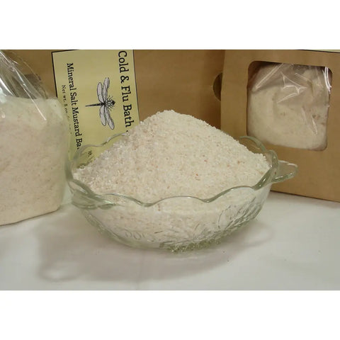 Cold & flu bath soak products in kraft paper packaging with mineral salt and mustard bath ingredients.