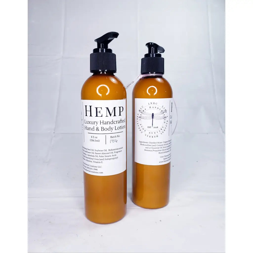 Two amber-colored bottles of hemp-based hand and body lotion with pump dispensers.