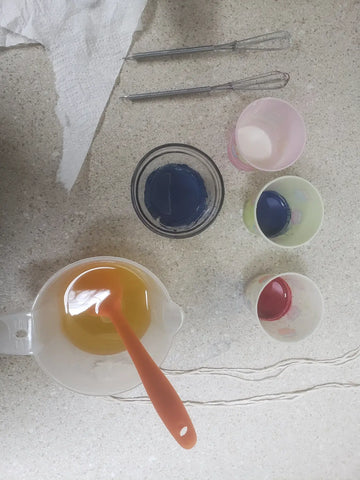 Ingredients and tools for soap making with acrylic string pull technique and natural herbal creations