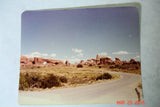 Landscape photo of desert road with red rocks near Arches National Park for cold process soap inspiration