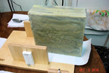 Large greenish layered soap showcasing wood grain technique for Lisas Natural soap challenge
