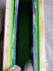 Long wooden soap mold with green silicone liner and blue dividers for Rimmed Soap Challenge