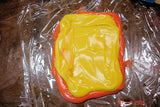 Colorful orange and yellow slime for soap challenge featuring oatmeal milk and shea butter