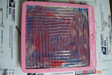 Pink framed magnetic drawing board with colorful metallic pens for carved soap and craft knife projects