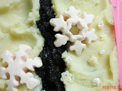 Soap block with snowflake decorations and black wavy line for Mauna Kea Februarys Soap Challenge