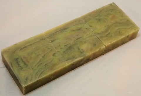 Greenish-yellow variegated stone block showcasing wood grain technique for Lisas Natural soap challenge