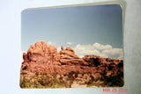Postcard of Arches National Park desert landscape with red rocks and blue sky for cold process soap
