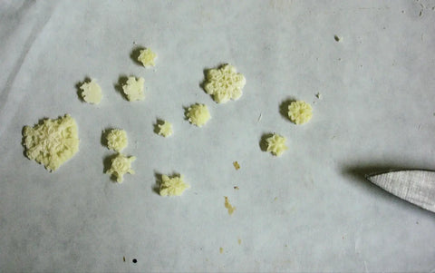 Small light-yellow star-shaped edible decorations for Mauna Kea Februarys Soap Challenge