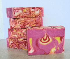 Stacked and individual bars of tear drop swirl soap with Sea Island Grapefruit scent