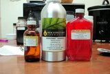Three bottles of essential oils for Green Wood soap challenge using wood grain technique