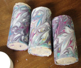 Three rimmed soap blocks with colorful swirl patterns from the Rimmed Soap Challenge March 2016