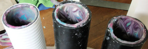 Three open rimmed soap pipes with colorful swirled contents from the Rimmed Soap Challenge March 2016