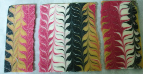 Colorful layered rimmed soap bars showcasing advanced technique at the Soap Challenge March 2016