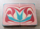 Swirled pink white and blue soap bars with floral design for Great Cakes Soap Challenge