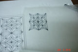 Black and white geometric patterns on paper for carved soap craft using wood chip carving