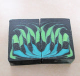 Black soap bars with green and blue swirl patterns from Great Cakes Soap Challenge