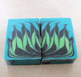 Handmade teal, black, and green swirled soap bars from My journey through Great Cakes Soap Challenge