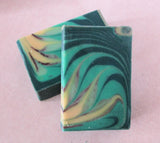 Swirled teal, cream, and dark green soap bars from Great Cakes Soap Challenge