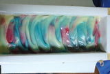 Uncut handmade soap with colorful swirls from Great Cakes Soap Challenge showcasing soap recipe