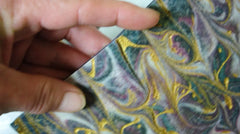 Vibrant marbled paper with gold, purple, green, white for Rimmed Soap Challenge March 2016