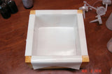 White rectangular mold with wooden frame for Tangerine Dancing Funnel Swirl Soap infusion